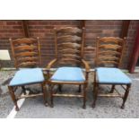 SET OF 6 GOOD QUALITY ELM LADDERBACK DINING CHAIRS WITH RUSH SEATS, having blue fabric covered loose