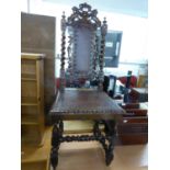 A VICTORIAN PROFUSELY CARVED OAK SINGLE CHAIR OF SEVENTEENTH CENTURY STYLE