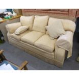 A THREE SEATER SETTEE