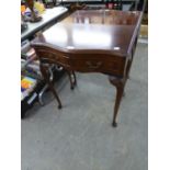 NEAR PAIR OF SMALL MAHOGANY SIDE TABLES, WITH SERPENTINE FRONTS AND SINGLE DRAWER, RAISED ON LONG