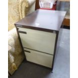 A TWO DOOR FILING CABINET