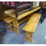 A PITCH PINE MODERN REFECTORY STYLE KITCHEN TABLE AND A PAIR OF BENCH SEATS ENSUITE (3)