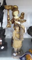TWO PAINTED AND GILT COMPOSITION TORCHERES, ONE IN THE FORM OF WINGED ANGEL, 16in (40.7cm) HIGH, THE