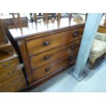 VICTORIAN FIGURED MAHOGANY CHEST OF THREE LONG DRAWERS WITH TURNED WOOD KNOB HANDLES, ON PLINTH