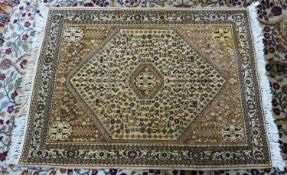 EASTERN RUG with large hexagonal centre panel having small centre hexagonal medallion, the panel