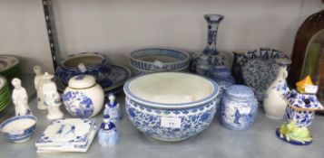 23 PIECES OF 20th CENTURY BLUE AND WHITE EUROPEAN AND ORIENTAL POTTERY, INCLUDING DUTCH DELFT BALL