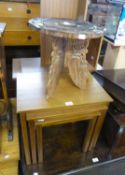 THREE TEAK OBLONG COFFEE TABLES AND AN EASTERN CARVED AND PIERCED CIRCULAR COFFEE TABLE (4)