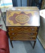 A MAHOGANY AND MARQUETRY BUREAU WITH THREE LONG DRAWERS, ON SLENDER SQUARE TAPERING LEGS, 2? WIDE