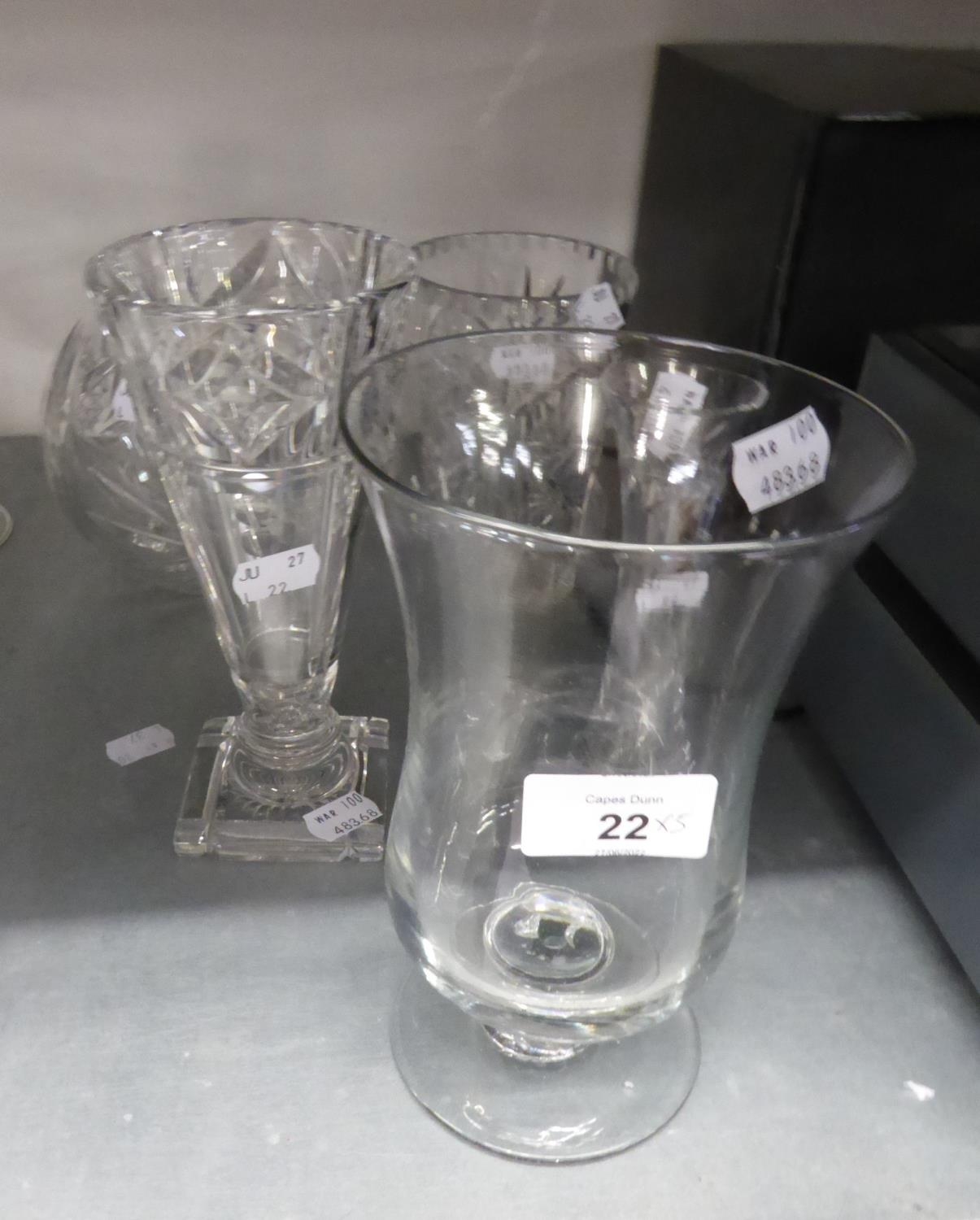 CUT GLASS SPHERICAL VASE, 5 ¼? (13.3cm) HIGH; A CUT GLASS TRUMPET VASE, ON SQUARE BASE, 7 ½? (