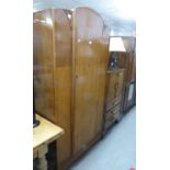 AN OAK SINGLE DOOR HANG WARDROBE AND AN OAK MILLINERY CABINET WITH TWO DOORS OVER THREE DRAWERS