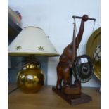 CARVED WOOD ELEPHANT PATTERN DINNER GONG AND POTTERY GLOBULAR TABLE LAMP AND SHADE (2)