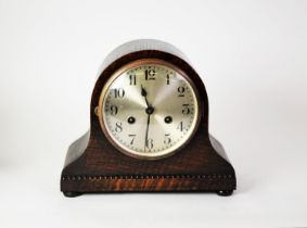 CIRCA 1920's OAK CASED NAPOLEONS HAT SHAPE MANTEL CLOCK WITH MOVEMENT STRIKING ON A COILED GONG