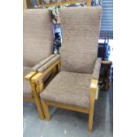 A MODERN LIGHT BEECHWOOD FRAMED FIRESIDE ARMCHAIR