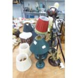 NINE VARIOUS TABLE LAMPS, ANOTHER IN THE FORM OF A SIMPLE OIL LAMP AND A MODERN COPPER METALLIC