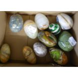 COLLECTION OF 11 ORNAMENTAL EGGS, ONYX PAPIER MÂCHÉ, ETC., IN BLUE AND WHITE POTTERY BOWL