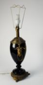 LATE NINETEENTH CENTURY GILT METAL MOUNTED MIDNIGHT BLUE GLASS TABLE LAMP, of two handled urn form