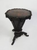 NINETEENTH CENTURY CARVED OAK CELLARETTE, the lift off two piece octagonal top with shell capped