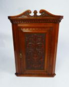 VICTORIAN CARVED OAK SMALL CORNER CUPBOARD, The dentil moulded cornice with swan neck cresting,