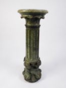 CARVED GREEN VEINED MARBLE COLUMN, of part fluted form, the base carved with mythical fish, 33? (