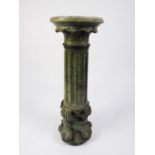 CARVED GREEN VEINED MARBLE COLUMN, of part fluted form, the base carved with mythical fish, 33? (