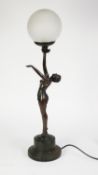 ART DECO STYLE BRONZED COMPOSITION FIGURAL TABLE LAMP in the form of a semi-naked female dancer