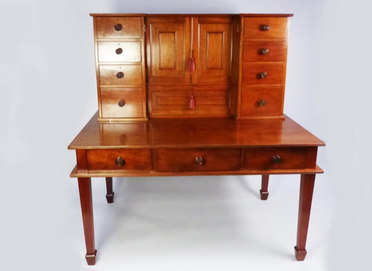 MODERN WALNUT ESTATES DESK WITH HIGH RAISED AND FITTED BACK the desk of typical form with three