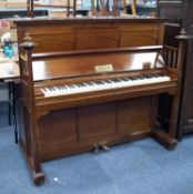 BLUTHNER UPRIGHT PIANOFORTE with metal framed straight strung movement, with applied maker's Leipzig