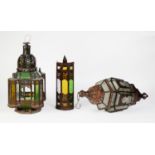MODERN MIDDLE EASTERN PIERCED METAL GREEN AND PLAIN GLASS PANELLED PENDANT CANDLE LANTERN, of square