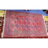 TURKOMAN BOKHARA FLAT WEAVE LARGE KELIM RUG, with two rows of seven large primary guls on a pink