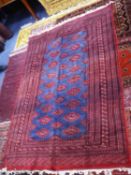 PAKISTAN BOKHARA CARPET, the blue field filled with red, white and orange primary guls, multiple