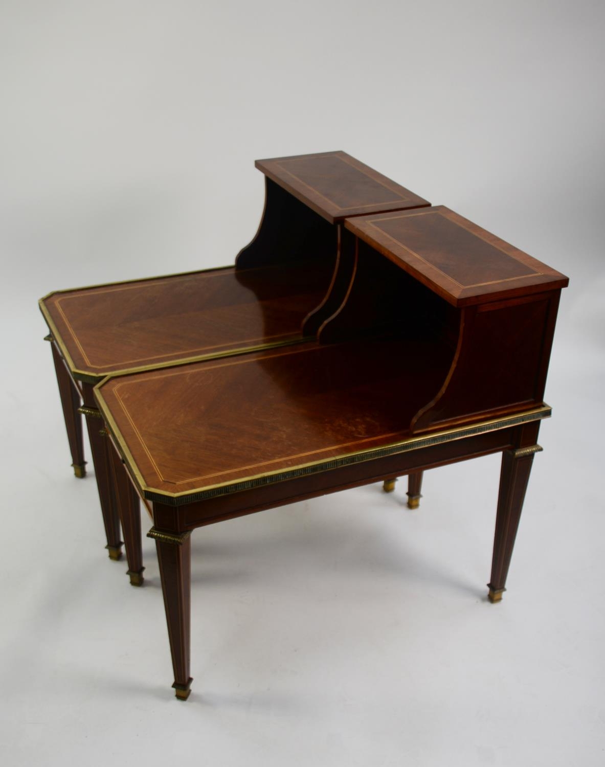 PAIR OF LOUIS XVI STYLE LINE INLAID MAHOGANY BEDSIDE TABLES, with brass mounts, raised canopy backs,