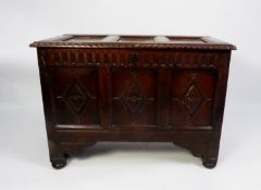 EIGHTEENTH CENTURY OAK BLANKET CHEST, the three panel top above a conforming front with lozenge