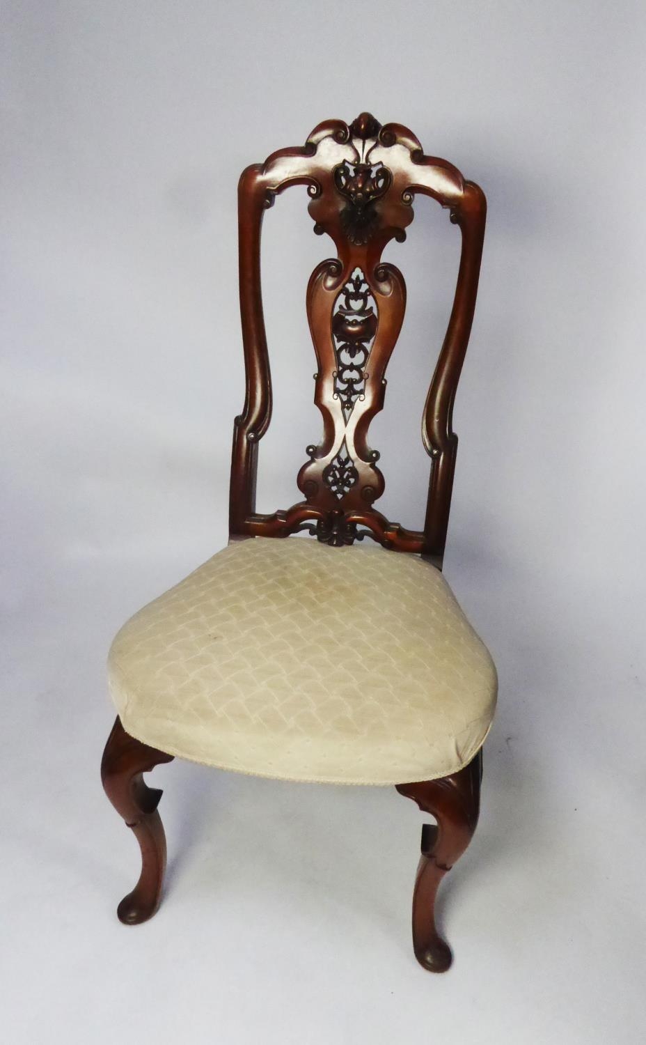 NINETEENTH CENTURY DUTCH STYLE CARVED WALNUT SINGLE DINING HAIR, the moulded high back with arch top