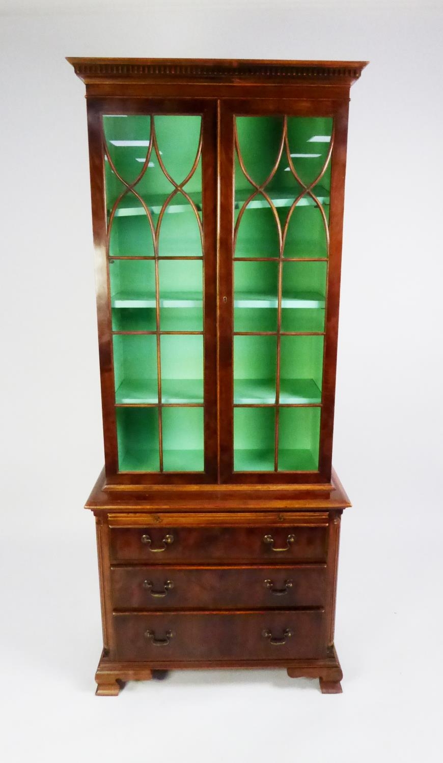 MODERN YEW WOOD SMALL LIBRARY BOOKCASE, the dentil moulded cornice above a pair of thirteen panel