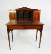 MAPLE & Co Ltd, EDWARDIAN MARQUETRY INLAID ROSEWOOD LADY?S WRITING DESK, the moulded oblong top with