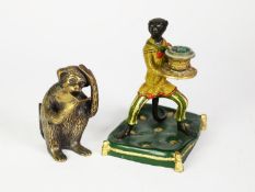 20th CENTURY COLD PAINTED CAST METAL CANDLEHOLDER IN THE FORM OF A MONKEY IN COSTUME, holding out