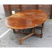 HEAVY QUALITY JACOBEAN STYLE OAK LARGE OVAL GATELEG DINING TABLE, on turned baluster legs