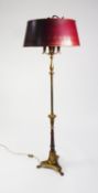 REPRODUCTION FRENCH EMPIRE STYLE TOLE AND BRASS FOUR LIGHT BOUILOTTE STANDARD LAMP, column decorated