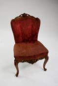 LOUIS XV STYLE ROCOCO CARVED OCCASIONAL CHAIR, having carved top rail, upholstered back and low