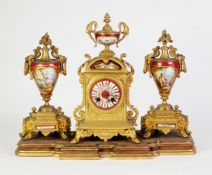 LATE 19th CENTURY FRENCH GILDED SPELTER and PORCELAIN INSET CLOCK GARNITURE, the JAPY FRERES