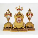 LATE 19th CENTURY FRENCH GILDED SPELTER and PORCELAIN INSET CLOCK GARNITURE, the JAPY FRERES