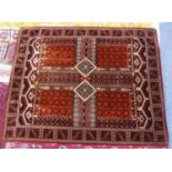 MACHINE WOVEN CHENILLE RUG, of Caucasian style, the quartered field brick red with black stenciled