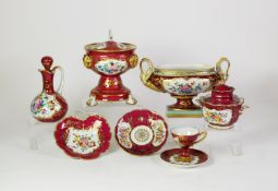 EIGHT PIECES OF PARIS PORCELAIN painted in reserves with flowers on maroon field