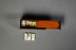 LATE NINETEENTH/ EARLY TWENTIETH CENTURY MINIATURE SET OF TWENTY EIGHT BONE DOMINOES IN A MAHOGANY