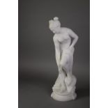 LATE 19TH CENTURY ITALIAN CARVED WHITE MARBLE FIGURE OF BATHING VENUS, partly draped, 19 ¼? (48.8cm)