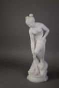 LATE 19TH CENTURY ITALIAN CARVED WHITE MARBLE FIGURE OF BATHING VENUS, partly draped, 19 ¼? (48.8cm)