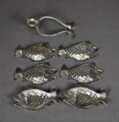 CONTINENTAL SILVER COLOURED METAL (800 STANDARD) SET OF SIX FISH PATTERN ASHTRAYS AND STAND, 5 ½? (