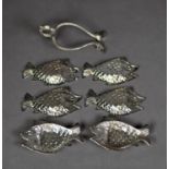 CONTINENTAL SILVER COLOURED METAL (800 STANDARD) SET OF SIX FISH PATTERN ASHTRAYS AND STAND, 5 ½? (