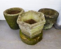 TWO RECONSTITUTED STONE HEXAGONAL TAPERING GARDEN VASES, with embossed floral girdle, 1ft 2 1/2in (