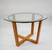 TEAK FRAMED BREAKFAST TABLE, with plate glass circular top, saltire stretchers, 47? (120cm) diameter